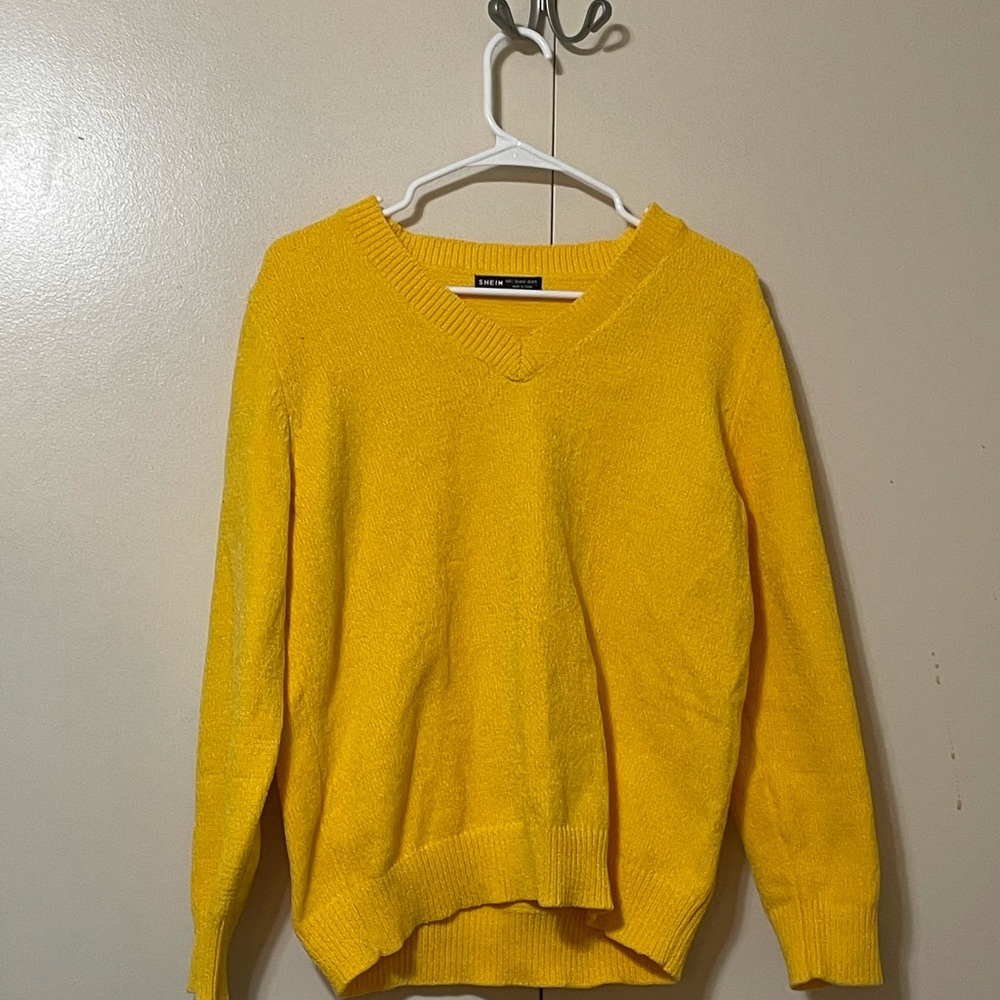 Soft yellow sweater. Great for fall/winter. Barley worn!